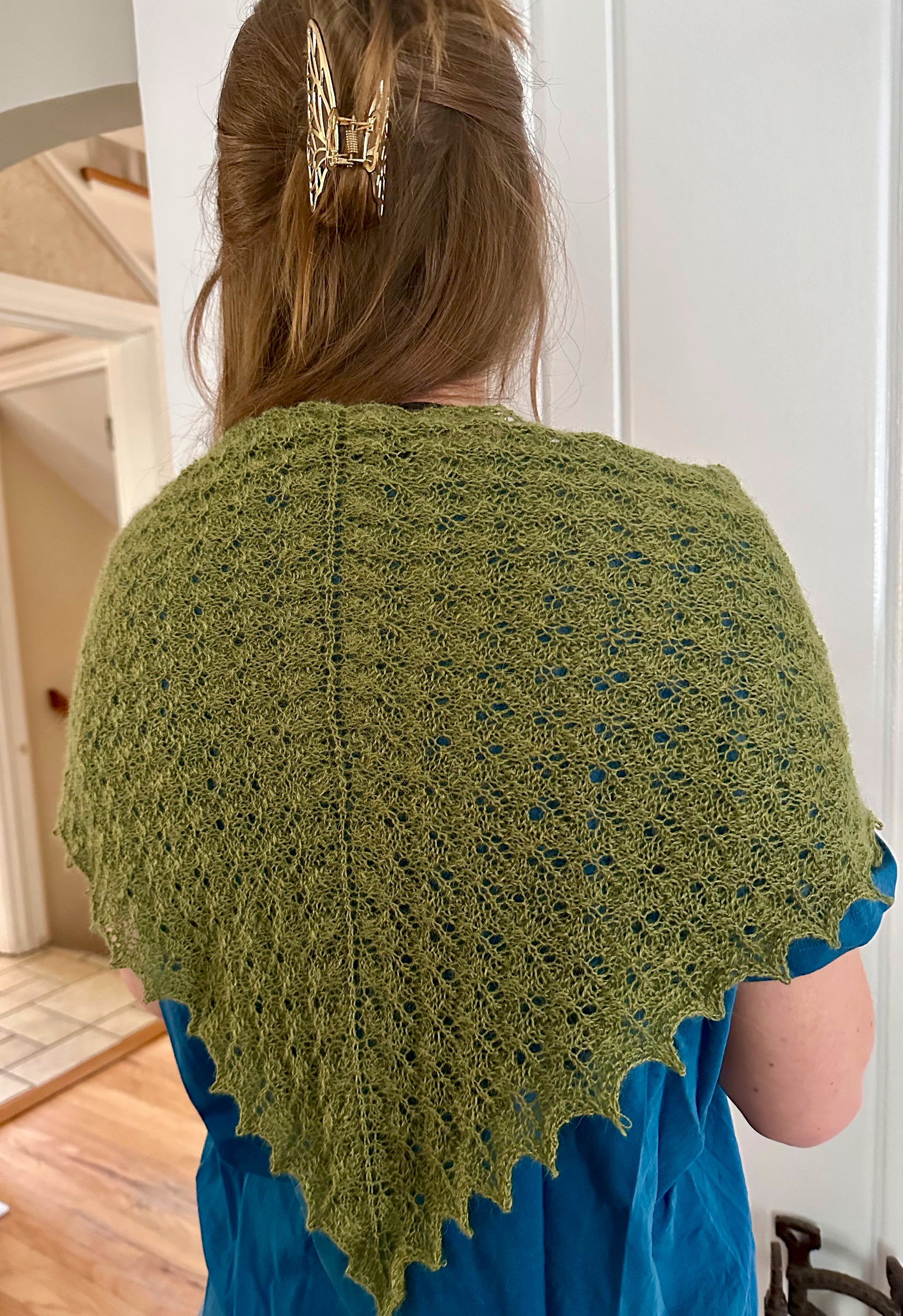 Woman wearing a green shawl